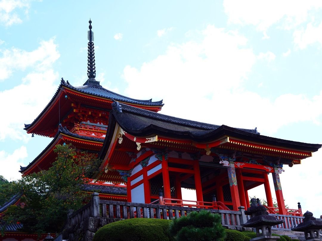Kiyomizu-dera in Kyoto, its wooden stage projecting over the autumn hillside